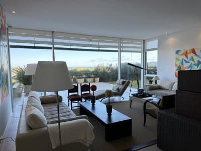 Brava | Apartamento #8082 Amplio living-comedor, cocina americana, toilette, todo con salida a una super terraza con vis